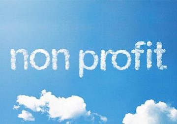 non profit written in clouds against blue sky